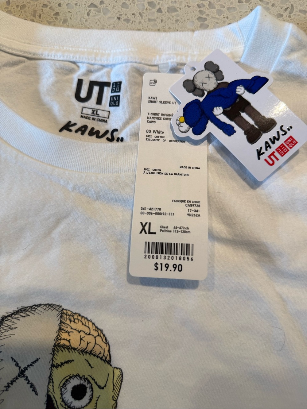Uniqlo White KAWS Graphic Tee with Blue Accent - XL